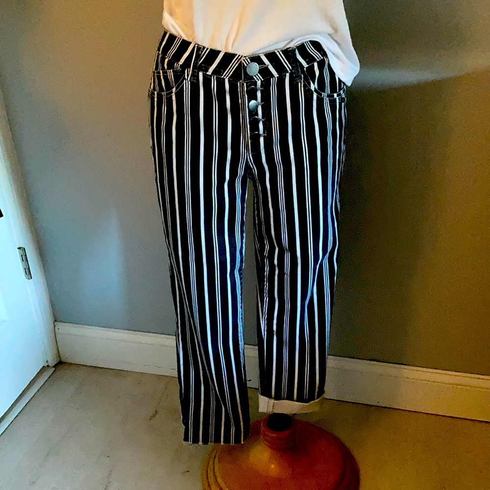 5 pocket blue/white stripe denim. 5 button front. Raw bottom or can be rolled